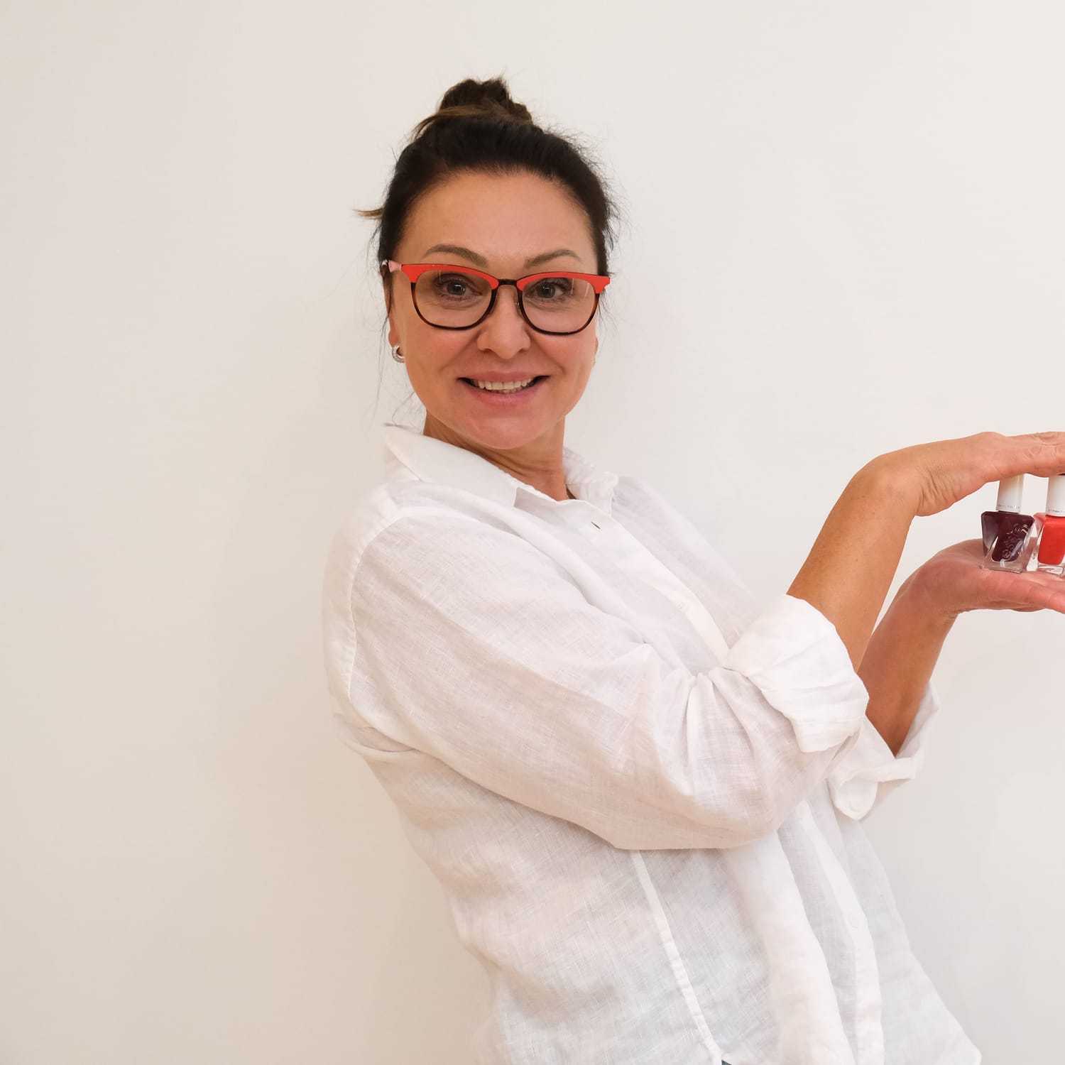 Portrait of Marina Kulikov, a professional stylist at Toka Salon, showcasing their expertise and style.