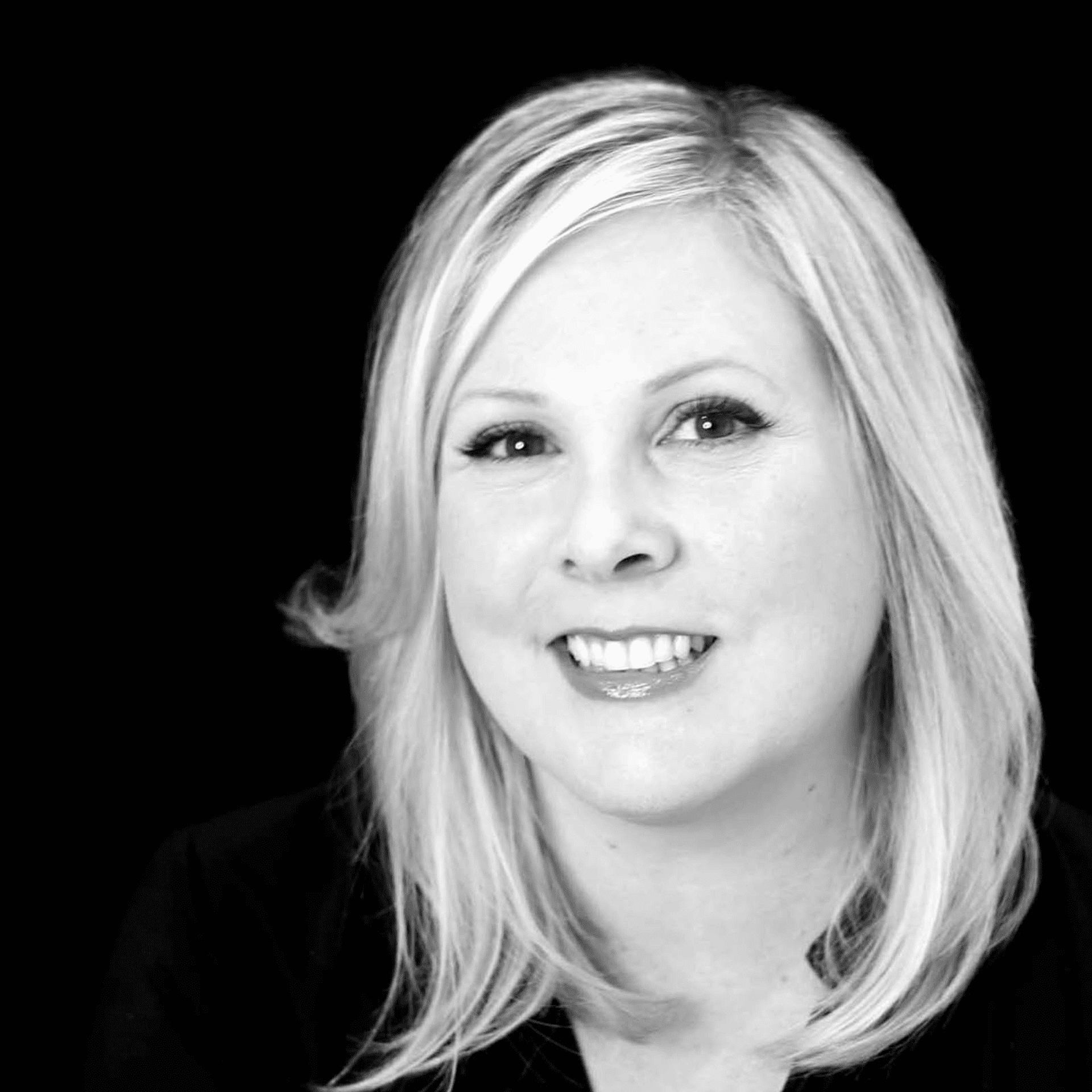 Portrait of Anne Marie Beckham, a professional stylist at Toka Salon, showcasing their expertise and style.