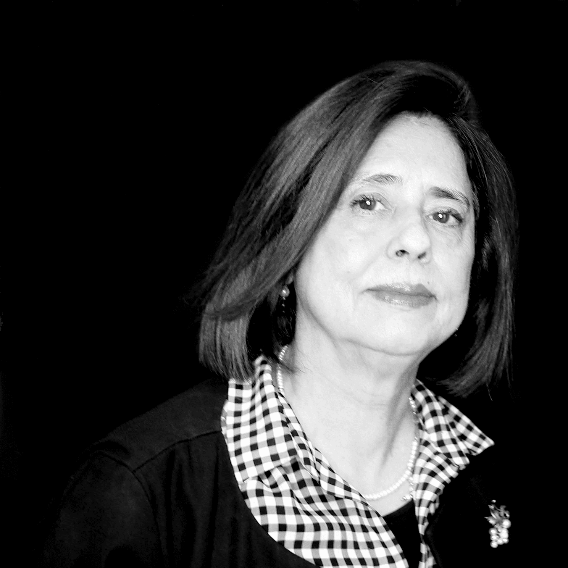 Portrait of Amparo Bernal, a professional stylist at Toka Salon, showcasing their expertise and style.