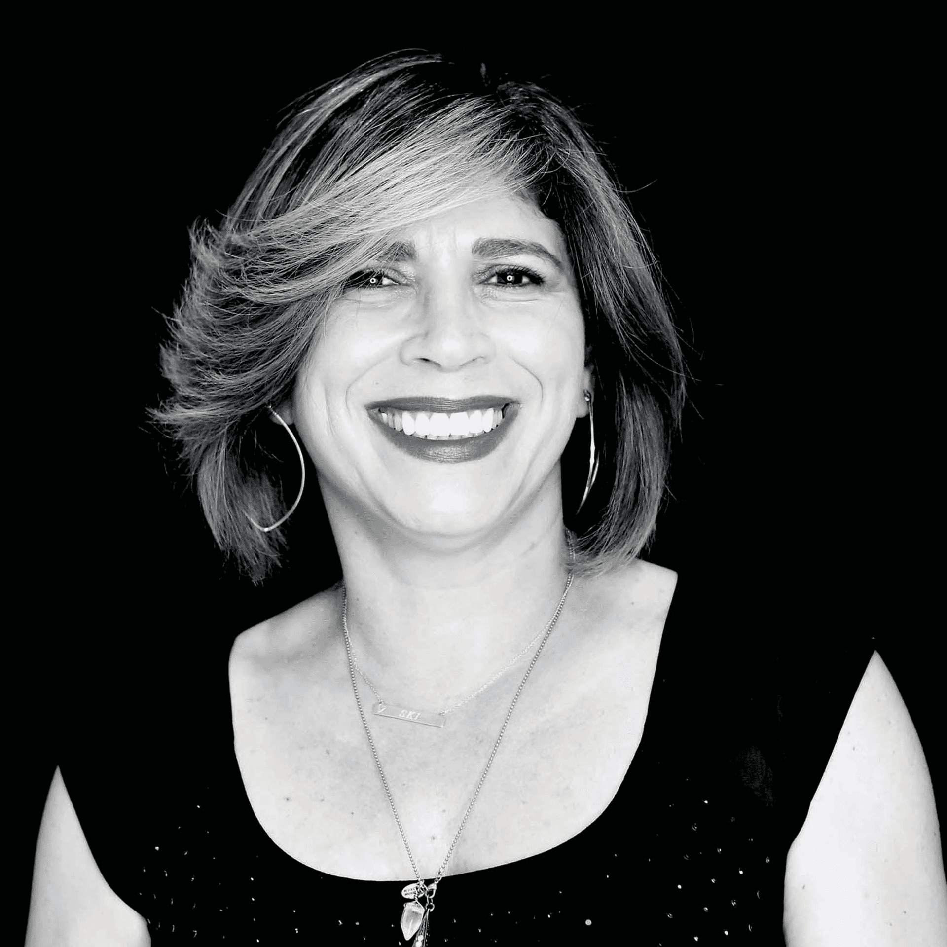 Portrait of Francesca Burzynski, a professional stylist at Toka Salon, showcasing their expertise and style.