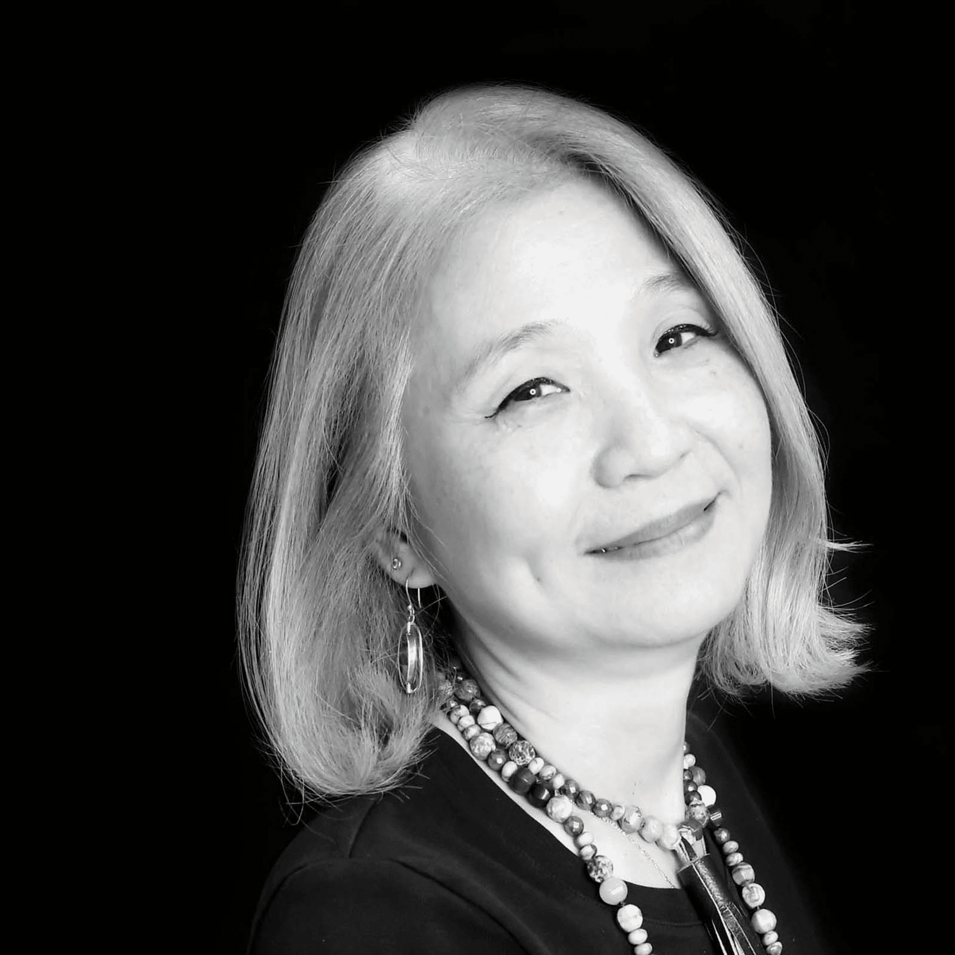 Portrait of Jennifer Chon, a professional stylist at Toka Salon, showcasing their expertise and style.