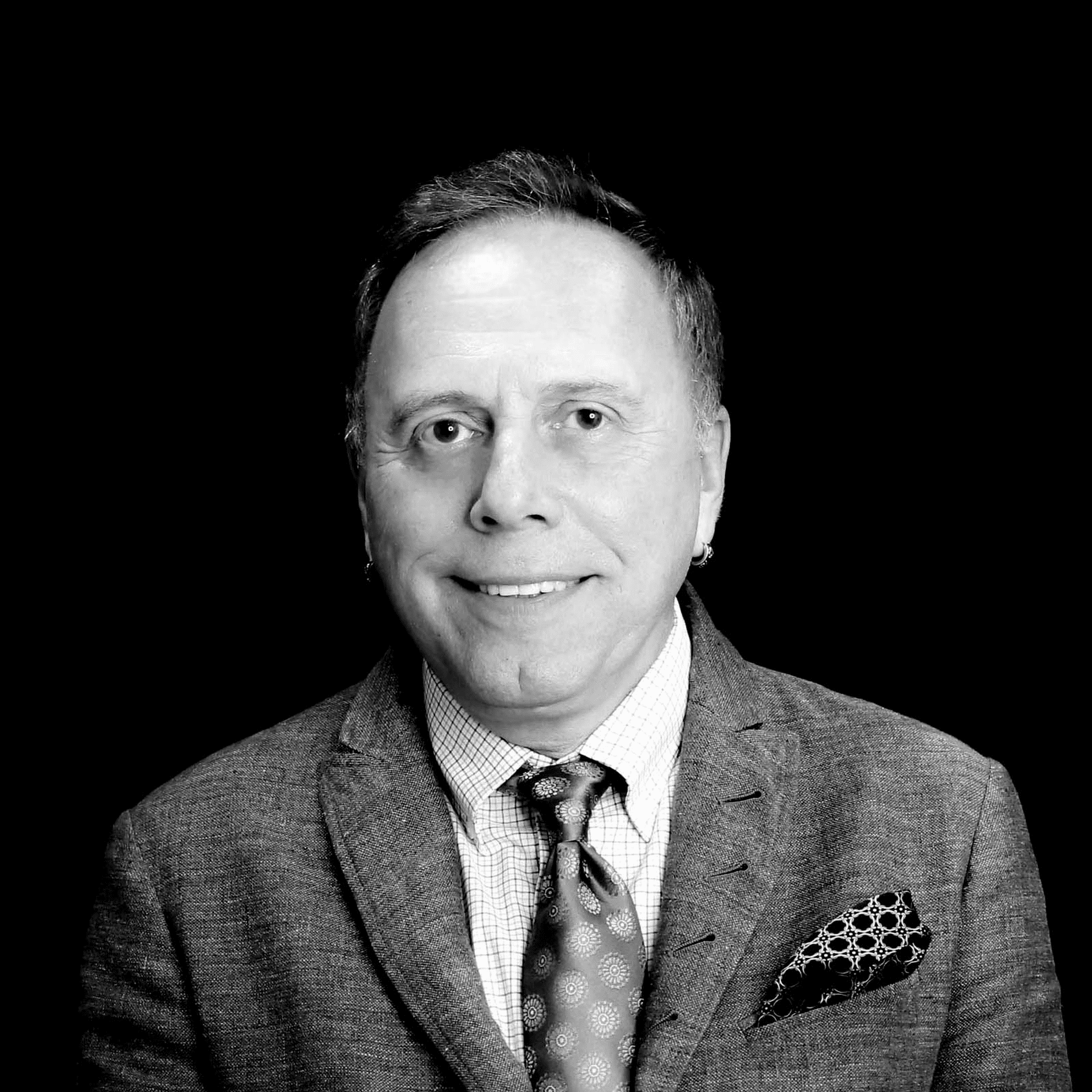 Portrait of Peter Emmand, a professional stylist at Toka Salon, showcasing their expertise and style.