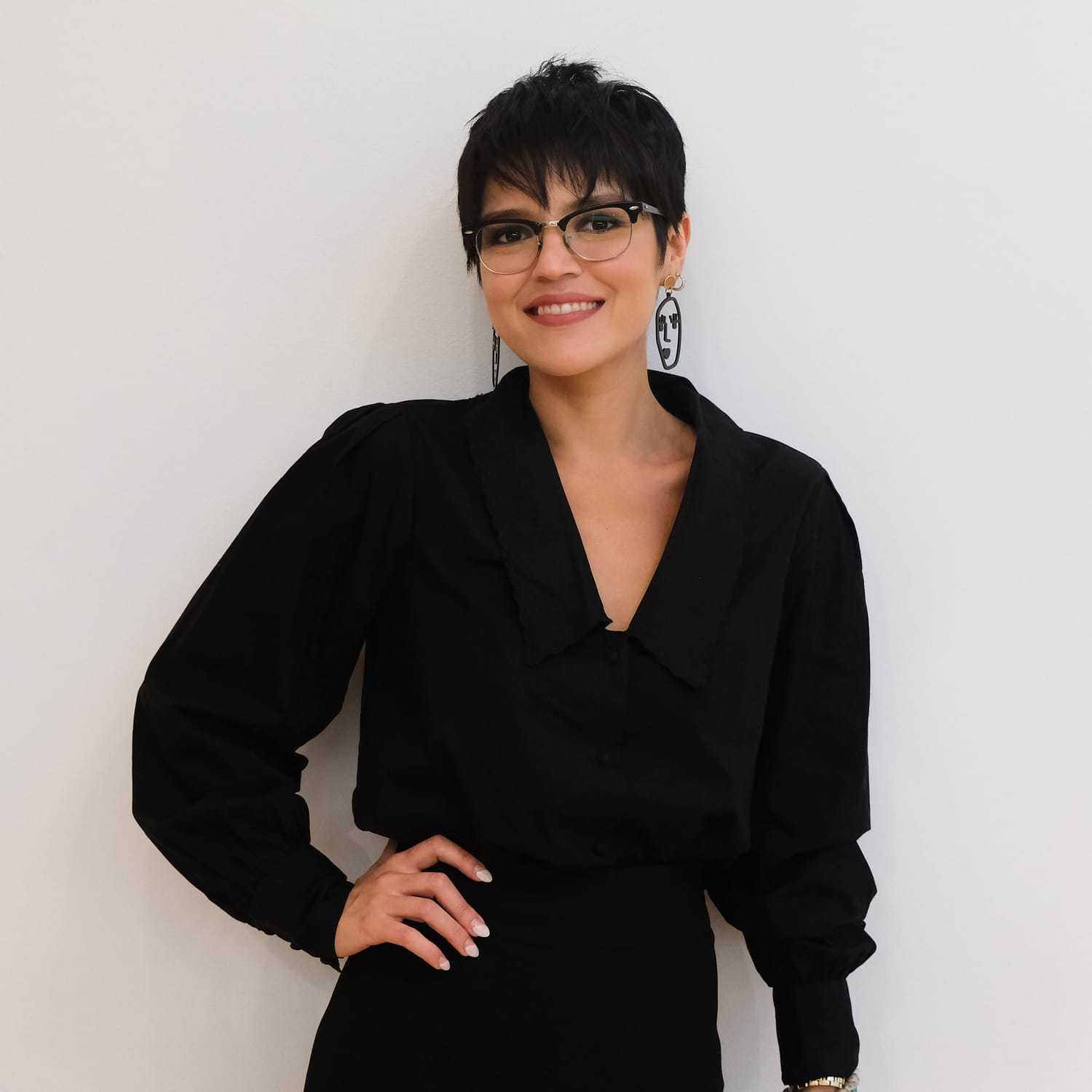 Portrait of Kimberly Correa, a professional stylist at Toka Salon, showcasing their expertise and style.