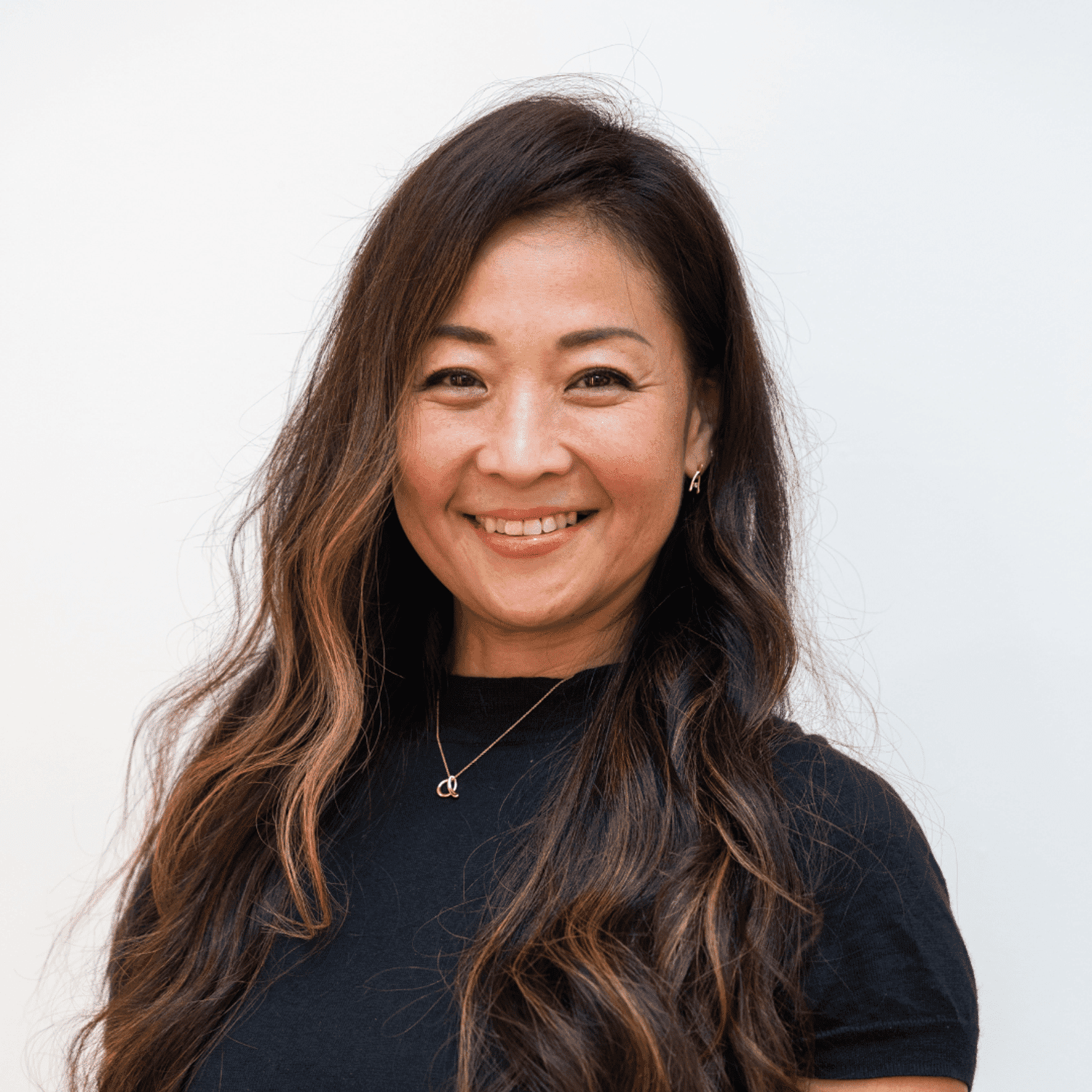 Portrait of Yoshie Sakuma, a professional stylist at Toka Salon, showcasing their expertise and style.