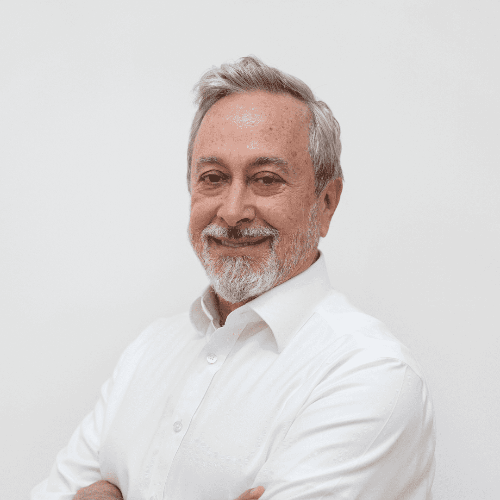 Portrait of Ernie Swain, a professional stylist at Toka Salon, showcasing their expertise and style.